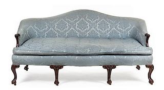 A George III Mahogany Sofa IN THE MANNER OF JOHN COBB Width 77 1/4 inches.