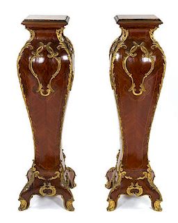 A Pair of Louis XV Style Gilt Bronze Mounted Kingwood and Parquetry Pedestals LATE 19TH CENTURY Height 48 1/2 inches.
