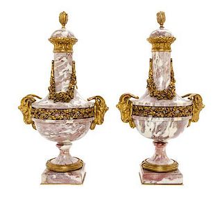 * A Pair of Louis XVI Style Gilt Bronze Mounted Marble Urns Height 16 inches.