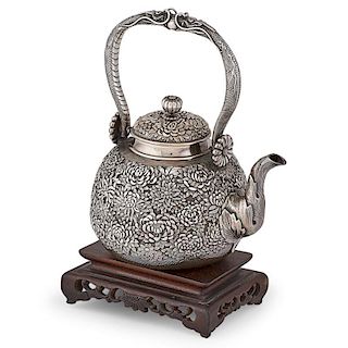 CHINESE SILVER REPOUSSE TEAPOT ON STAND