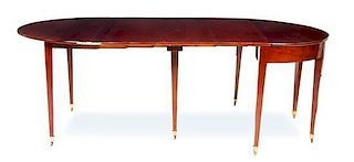 A Brass Mounted Mahogany Extension Table MAISON JANSEN Height 28 1/2 x width 43 1/2 x depth 21 inches (closed).