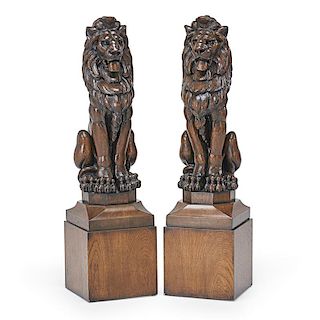 PAIR OF ENGLISH OAK CARVED SEATED LIONS