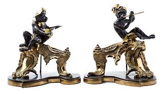 A Pair of Louis XV Style Gilt and Patinated Bronze Figural Chenets Height 14 inches.