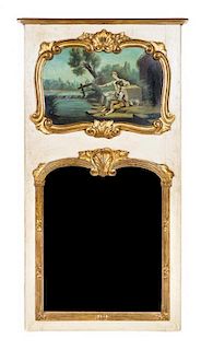 A French Painted and Parcel Gilt Trumeau Mirror EARLY 20TH CENTURY Height 54 x width 29 inches.