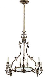 A Louis XV Style Cut and Frosted Glass Mounted Gilt Metal Chandelier Height 64 x diameter 34 inches.