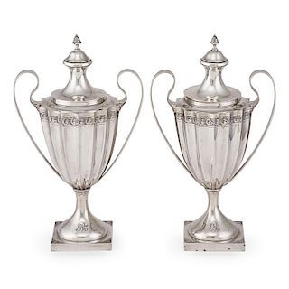 PAIR OF GEORGE III STYLE SILVER COVERED URNS