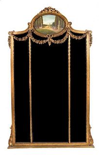 A Louis XV Style Giltwood Pier Mirror Height 74 x width 43 1/2 inches.