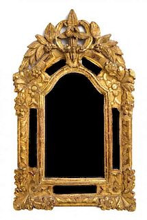 A Regence Giltwood Mirror 18TH CENTURY Height 23 x width 14 1/4 inches.