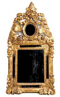 A Louis XIV Giltwood Mirror 18TH CENTURY Height 30 1/2 x width 15 3/4 inches.