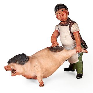 BUTCHER AND RELUCTANT PIG SCULPTURE
