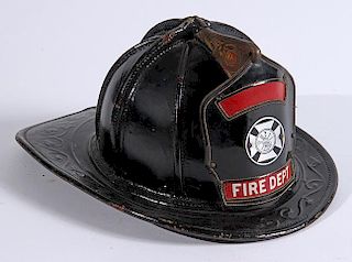 Leather fireman's helmet with a replaced medallion on front, fine condition