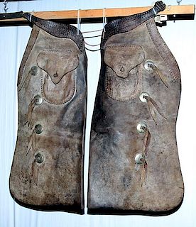 Cowboy item, a pair of Porter chaps with pocket and eight conchos, late 19th century