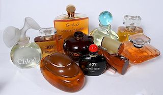 Display Perfume bottle collection, a group 10 perfume bottles with name brands that can be seen in photos