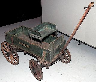 Rare Hickory sample or child's wagon in fine condition, wagon retains most of it original paint with "Hickory" painted on bot