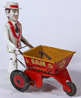 "Sam the Gardner" plastic Sam with tin cart, Marx Toy Co. very nice condition and working