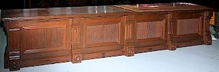 Victorian store counter, 28" x 32" x 14' 5", a beautiful example which is stained walnut with five identical step columns, re