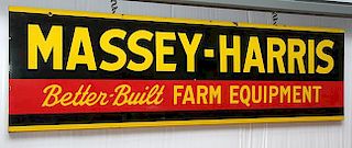 Massey-Harris porcelain three color sign 8' x 28", fine condition except for a few small chips that may be seen in photo
