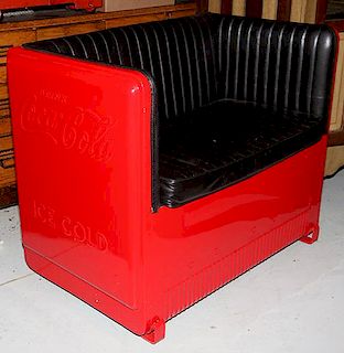 Coca-Cola cooler bench, a vintage coke icebox which has been customized as a sofa with a black seat and back, 24" x 35" x 41"