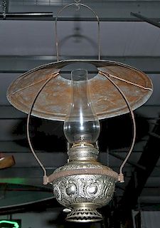 Country store hanging light, "The Miller Lamp", nickel plated ornate base with original globe-burner and hanger