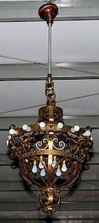 Theatre chandelier, a massive early 20th century, elegant ballroom chandelier, lighted ring atop and interior, something you 