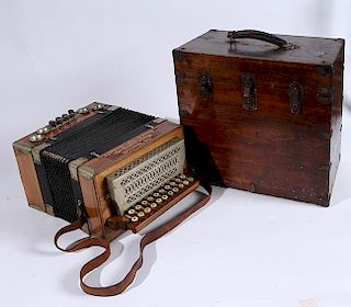 Fancy accordion in original box.