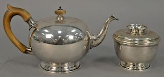 Two piece sterling silver partial tea set to include a tea pot and covered sugar, both marked E.T. St. John Hartford, Reprodu