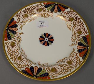 Set of twelve Copeland porcelain dinner plates, gold decorated border and painted red, green, and blue fan decoration, sold b