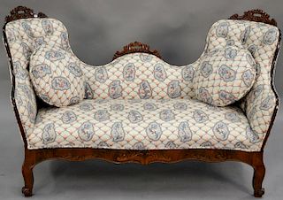 Victorian walnut loveseat with tufted upholstered back. wd. 60in.