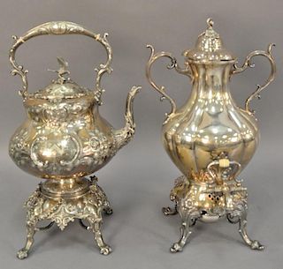 Two silverplate hot water pots, one with bird finial. ht. 16 1/2in. & ht. 17in.