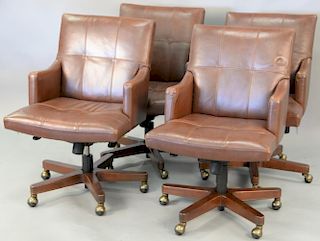 Four Councill leather office chairs.