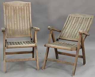 Set of six teak folding armchairs.
