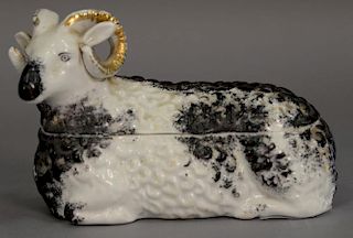 Russian porcelain box in the form of a ram, polychrome decorated. ht. 4 1/4in., lg. 6 1/2in.