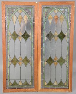 Pair of rectangle stained leaded glass windows. 57" x 22" each