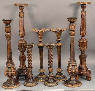 Group of eight decorative pricket candlesticks. ht. 16in. to 30 1/2in.