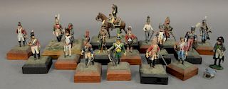 Group of sixteen lead soldiers, hand painted, most on wood bases. ht. 3 1/2in. to 4 3/4in.