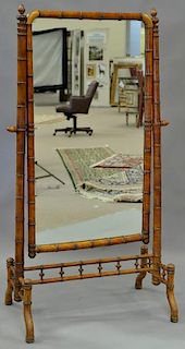 Faux bamboo cheval mirror. ht. 62 1/2in., wd. 36in.
