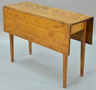 Federal drop leaf table with tapered legs. ht. 29in., top: 14" x 42"