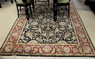 Oriental red, black, and tan carpet. 6' x 8'