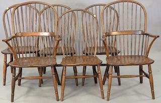 Set of six oak Windsor style chairs with two arm.