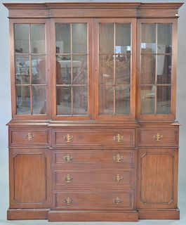 Mahogany breakfront with center drawer with drop front desk. ht. 82in., wd. 66in.