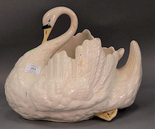 Large Majolica swan planter, white glaze with yellow beak and feet. ht. 11in., lg. 14in.