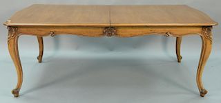 French Louis XV style dining table with one large 27inch leaf. ht. 29in., lg. 78in., wd. 45in., opens to 105in.