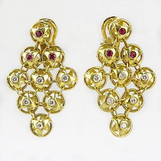 Contemporary Approx. .60 Carat Diamond, Ruby and 18 Karat Yellow Gold Chandelier Earrings.