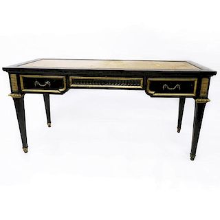 Karges Furniture Co. Ebonized and Gilt Desk with Leather Top.