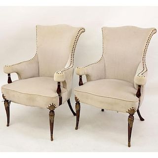 Pair of Mid Century Carved Mahogany and Upholstered Gainsborough Armchairs.