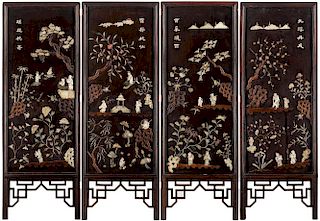 A CHINESE FOUR-PANEL HARDWOOD AND APPLIQUE SCREEN WITH MOTHER OF PEARL AND OTHER INLAYS