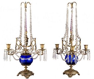 A PAIR OF RUSSIAN BRASS AND GLASS-CUT CANDELABRA