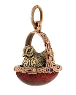 A FABERGE GOLD EGG AND GUILLOCHE ENAMEL PENDANT WITH A GOLDEN HEN IN A BASKET, HENRIK WIGSTROM, ST. PETERSBURG, 1908-1917