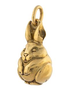 A KOECHLI GOLD EGG PENDANT IN THE FORM OF A RABBIT, WITH THE WORKMASTERS MARK OF FRIEDRICH KOECHLI, RUSSIA, CIRCA 1890