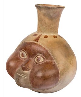 A PRE-COLUMBIAN MOCHE-STYLE VASE OF A MAN'S HEAD, PERU, C. 400 AD